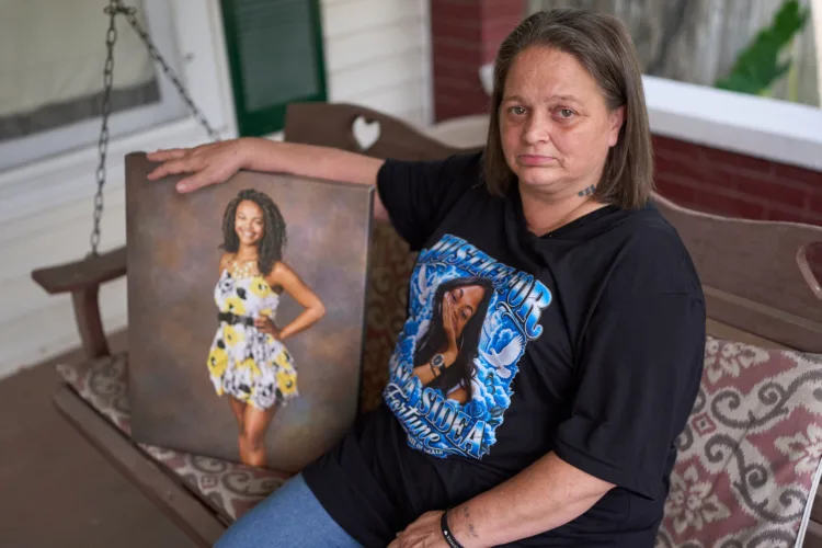 Hanging was 'staged' after woman's death in drug dispute, police say